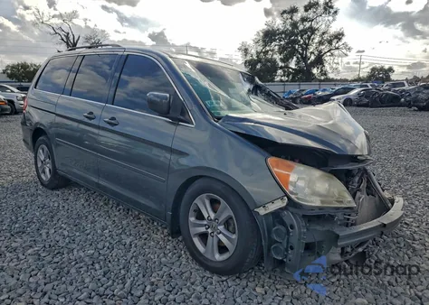 2010 Honda Odyssey Touring z USA, uszkodzony, nr VIN 5FNRL3H96AB055932